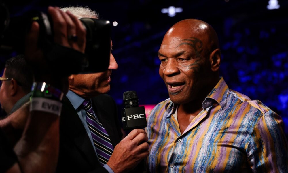Mike Tyson speaks during a ringside interview at a boxing event in 2026.