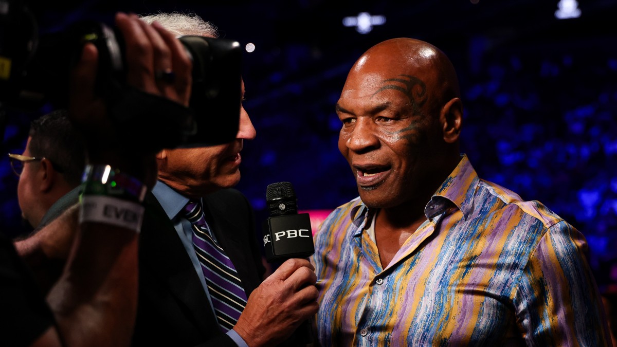 Mike Tyson speaks during a ringside interview at a boxing event in 2026.