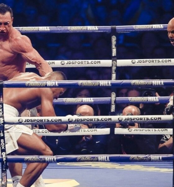 Wladimir Klitschko stands over Anthony Joshua after knocking him down during their heavyweight title fight at Wembley Stadium in 2017