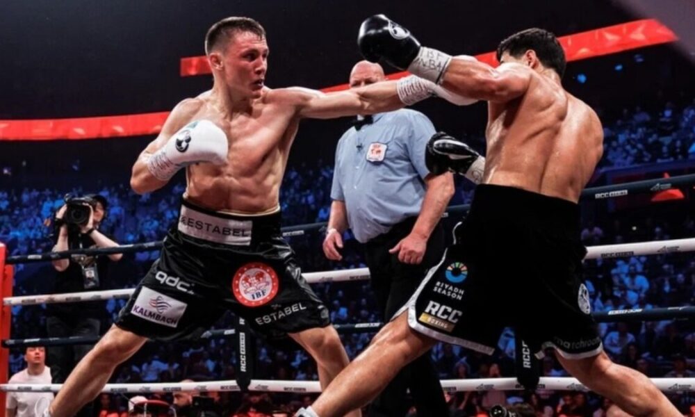 Michael Eifert throws a jab at Dmitry Bivol during their IBF light heavyweight title fight in Ekaterinburg, Russia, where Eifert landed a record-low 12 punches.