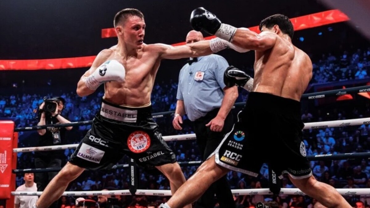 Michael Eifert throws a jab at Dmitry Bivol during their IBF light heavyweight title fight in Ekaterinburg, Russia, where Eifert landed a record-low 12 punches.