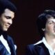 Sylvester Stallone stands beside Muhammad Ali during an Oscars appearance at the height of Rocky's success in Hollywood