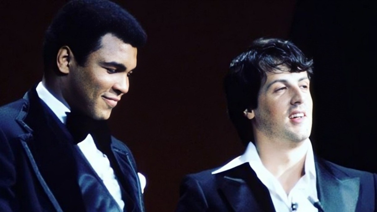 Sylvester Stallone stands beside Muhammad Ali during an Oscars appearance at the height of Rocky's success in Hollywood