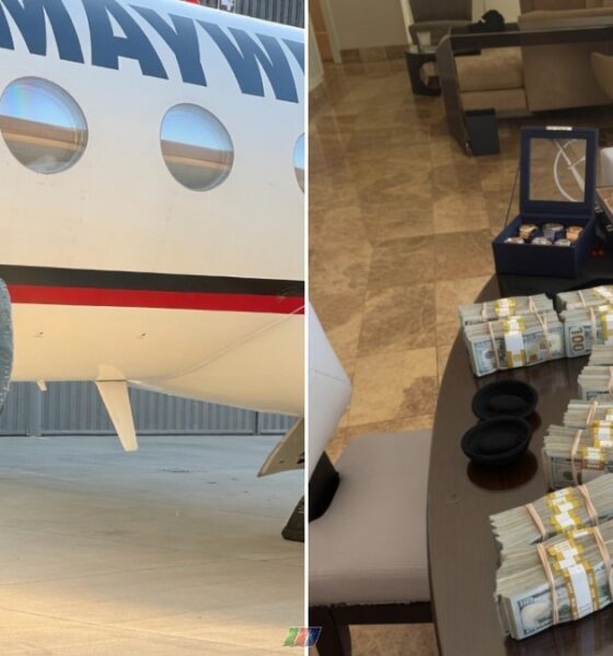 Floyd Mayweather stands beside a private jet while stacks of cash and luxury watches sit on a table amid growing scrutiny over the boxer's finances