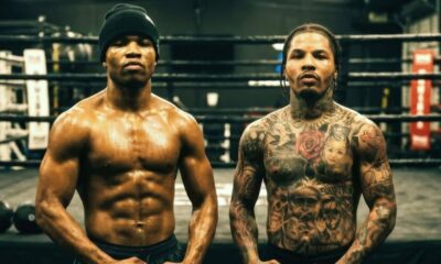 Floyd Schofield and Gervonta Davis pose in a boxing gym as negotiations continue following the WBA lightweight title order.