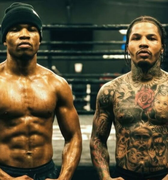 Floyd Schofield and Gervonta Davis pose in a boxing gym as negotiations continue following the WBA lightweight title order.