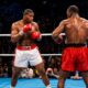 "Riddick Bowe's Stunning Upset: Dethroning Evander Holyfield in Heavyweight History"
