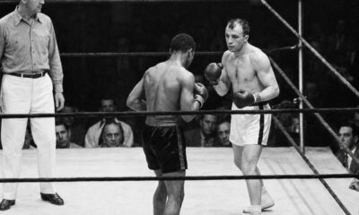 "Henry Armstrong vs Lou Ambers: A Legendary 15-Round Boxing War"