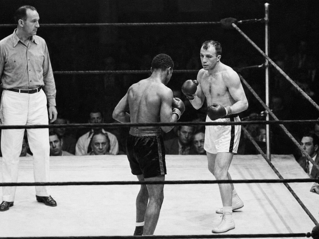 "Henry Armstrong vs Lou Ambers: A Legendary 15-Round Boxing War"