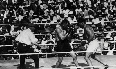 "Jack Dempsey Triumphs Over Tommy Gibbons in Tactical Heavyweight Title Defense on July 4, 1923"