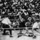 "Jack Dempsey Triumphs Over Tommy Gibbons in Tactical Heavyweight Title Defense on July 4, 1923"