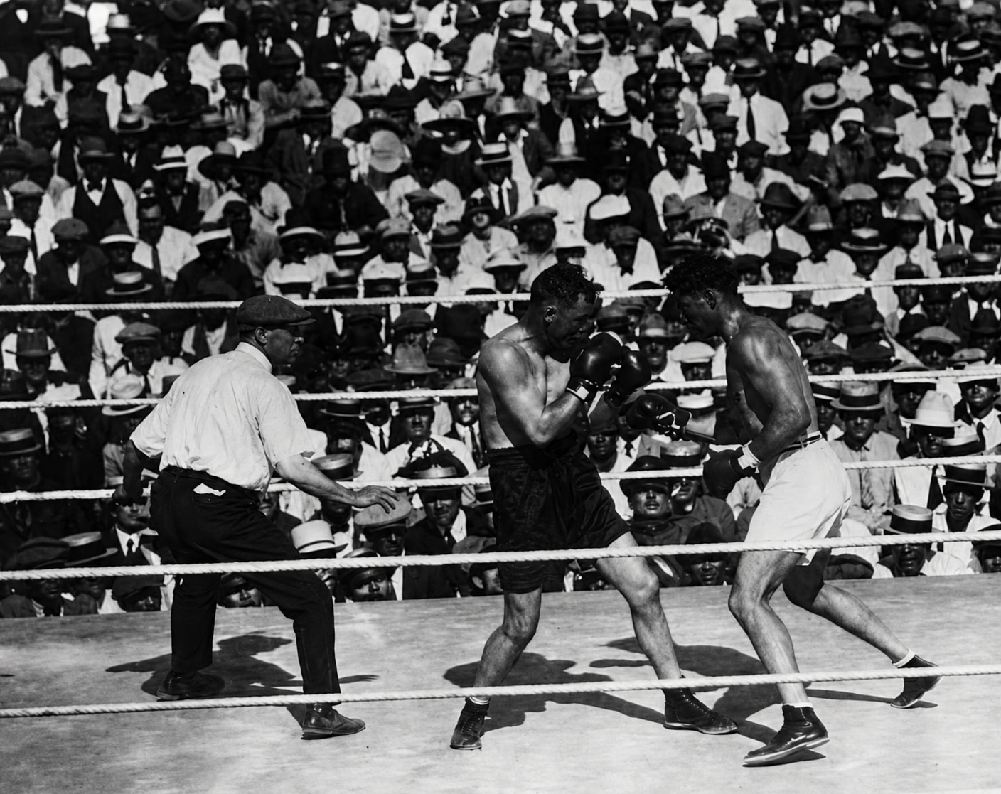 "Jack Dempsey Triumphs Over Tommy Gibbons in Tactical Heavyweight Title Defense on July 4, 1923"