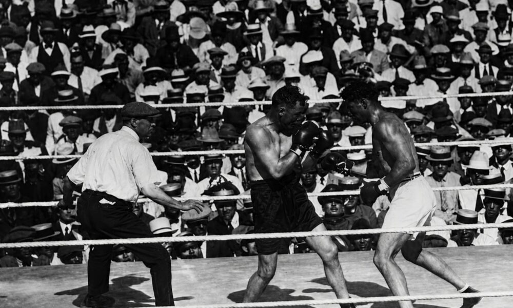 "Jack Dempsey's Tactical Victory Over Tommy Gibbons in 1923 Heavyweight Title Defense"