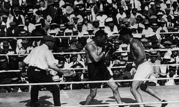 "Jack Dempsey's Tactical Victory Over Tommy Gibbons in 1923 Heavyweight Title Defense"