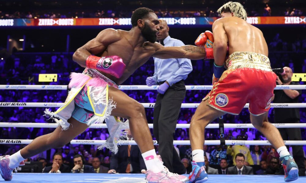 "Jaron Ennis Overcomes Intense Challenge to Defeat Xander Zayas"