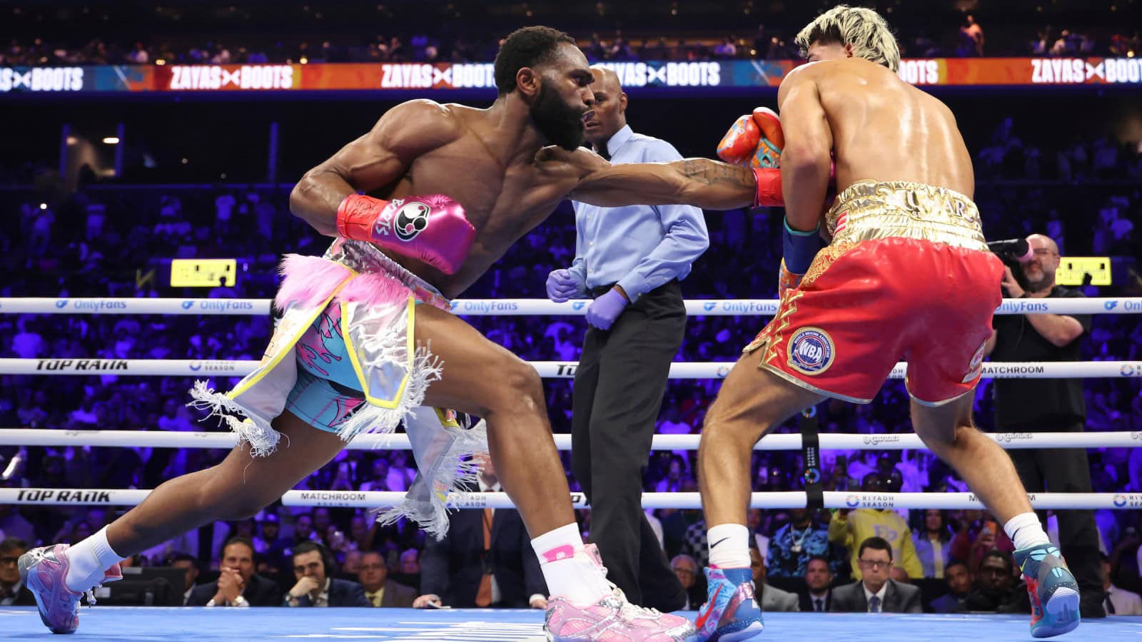 "Jaron Ennis Overcomes Intense Challenge to Defeat Xander Zayas"
