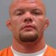 Anthony Smith update: Trial set after 'Not Guilty' plea following alleged wife altercation
