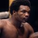 "George Foreman Dominates José Roman in Two Minutes: Tokyo Showdown"
