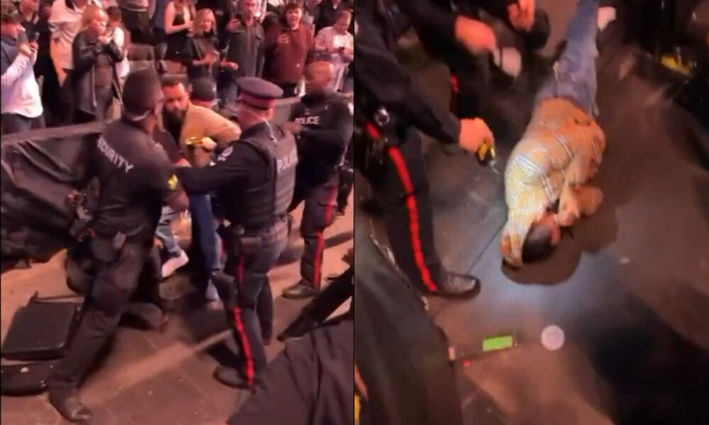 Police officer delivers KO slam to UFC Edmonton fan during wild crowd brawl (Video)